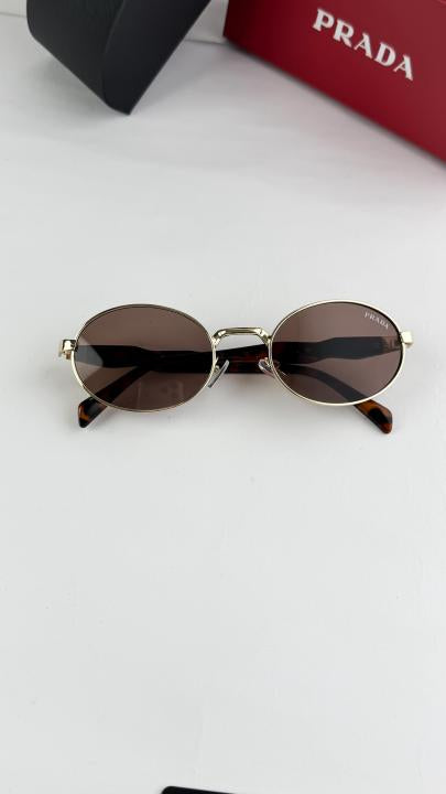 PRADA GOLD BROWN 6012