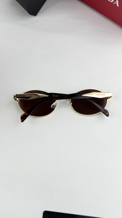 PRADA GOLD BROWN 6012